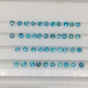 Natural brazilian (Unheated) paraiba perfect round cut good color 42 pieces 1.27 carat 1.9x1.9 mm