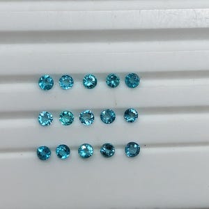 Fabulous (Unheated) neon blue brazilian paraiba perfect round cut good color 15 pieces 0.70 carat 2.2x2.2 mm