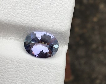 Genuine zoisite tanzanite faceted loop clean gemstone oval 1.05 carat 8x6x3.3 mm