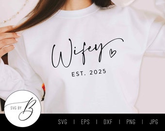 May include: White sweatshirt with the text "Wifey EST. 2025" in black script font with a small heart.