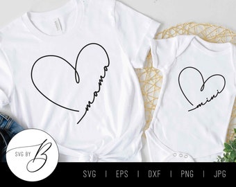 May include: Two white shirts with black heart designs. The larger shirt says "mama" inside the heart and the smaller shirt says "mini" inside the heart.