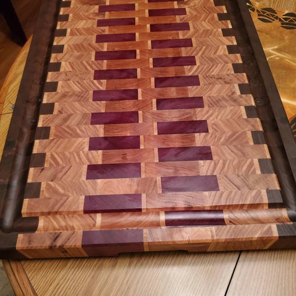 Custom made end grain cutting boards - Prices vary depending on size and type of wood used.