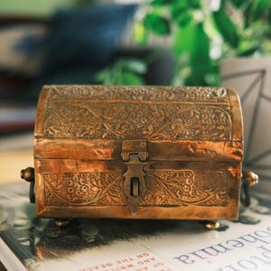 Vintage Embossed Brass Trinket Box: Ornate Footed Chest