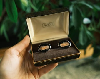 Gemelos Rolls-Royce vintage de esmalte ovalado negro Avon de 1972