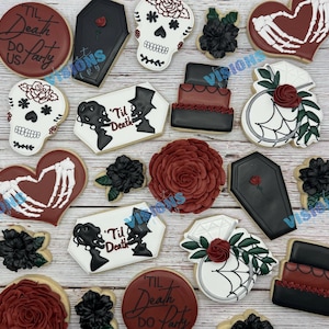 May include: A collection of 15 sugar cookies decorated with various designs, including skulls, hearts, flowers, and the phrase "Til Death Do Us Party".