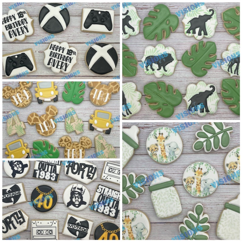 May include: A set of decorated sugar cookies featuring a jungle theme. The cookies are decorated with various jungle animals, including giraffes, elephants, and lions. There are also cookies with leaves, a jungle jeep, and a baby bottle. The cookies are decorated with green, brown, and yellow icing.
