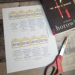 May include: Eight printable bookmarks with gold accents and a white background. Each bookmark features a different quote about reading. The bookmarks are titled "Blind Date with a Book".