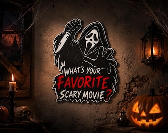 May include: A wall-mounted sign featuring the Ghostface character in a black hooded robe holding a knife, with the text "WHAT'S YOUR FAVORITE SCARY MOVIE?" in white and red lettering. The sign has a black background with a white outline.