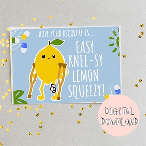 May include: A light blue card featuring a cartoon lemon on crutches. The card says "I HOPE YOUR RECOVERY IS... EASY KNEE-SY LEMON SQUEEZY!" with a pink circle that says "DIGITAL DOWNLOAD". Decorative pills and leaves are also present.