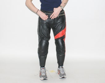 VINTAGE TROUSERS - Vintage 90s biker leather trousers in black / red