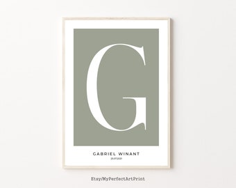 May include: A sage green printable poster with a large white letter G in the center. The text "GABRIEL WINANT 25.07.2021" is at the bottom of the poster.