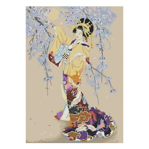 May include: A woman in a colourful kimono stands beneath a blossoming cherry blossom tree. The kimono has a yellow, red, purple and black pattern. The woman's hair is styled in a bun with a decorative hairpiece. The background is a light beige colour.