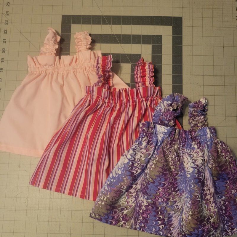 BABIES RUFFLE HEM DRESS WOODBLOCK WONDER main image 1