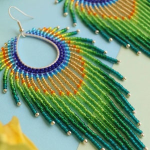 Peacock earrings Beaded fringe earrings Long feather earrings Peacock feather earrings Beadwork earrings Fringe hoop earrings