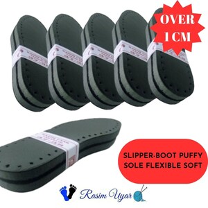 May include: Six pairs of black and gray puffy shoe soles, each over 1 inch thick. The soles are flexible and soft. The text "SLIPPER-BOOT PUFFY SOLE FLEXIBLE SOFT" is printed on a white label.