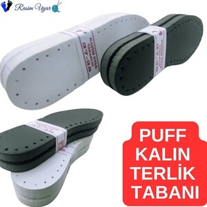 May include: Two pairs of white leather slipper soles with black foam inserts. The soles have a pattern of small holes and the text "Rasim Uyar Tabanlik 37-38" is printed on the side. The text "PUFF KALIN TERLIK TABANI" is printed on a red rectangle.