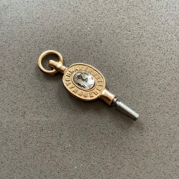 Antique W.Coutts Aberdeen Scottish Advertising brass pocket watch key winder oval natural white topaz pendant charm fob