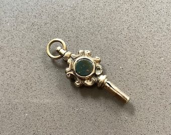 Antique Victorian dainty ornate gold cased repousse pocket double sided bloodstone flat disc watch key winder pendant charm fob