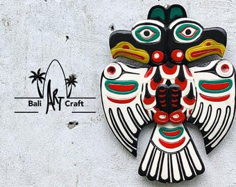 Hand-Carved Thunderbird Wall Art: Boho Tribal Decor  in Red, Black, Green & Yellow