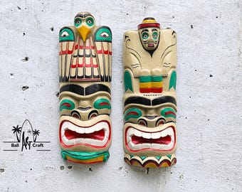 Handgeschnitzte Totemmasken: 2 Tribal Wandmasken mit Vogel & Wächter Figuren