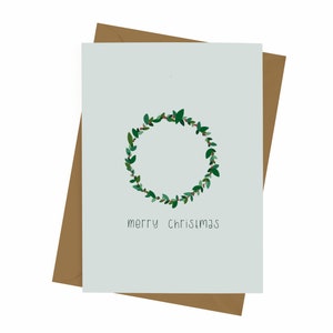 Feliz Navidad - Tarjetas navideñas - Tarjeta en blanco - Saludos - Navidad - Alegría - Corona - Celebración - Amor
