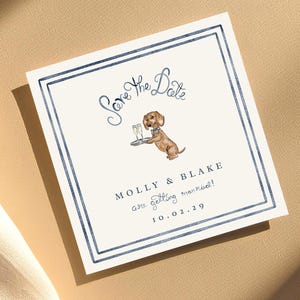 May include: Square wedding invitation with a watercolor illustration of a dachshund holding a tray with champagne glasses. The text reads "Save the Date" and the names "Molly & Blake" with the date "10.02.29" in a navy blue frame.