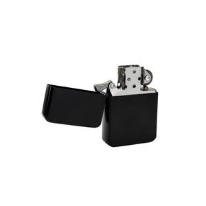 Close up of matte black petrol lighter finish