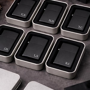 personalised Matte black lighter displayed as groomsmen gift