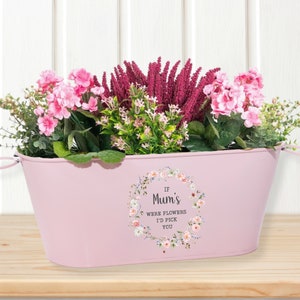 May include: Pink metal planter with a floral design and the text "If Mum's were flowers I'd pick you".