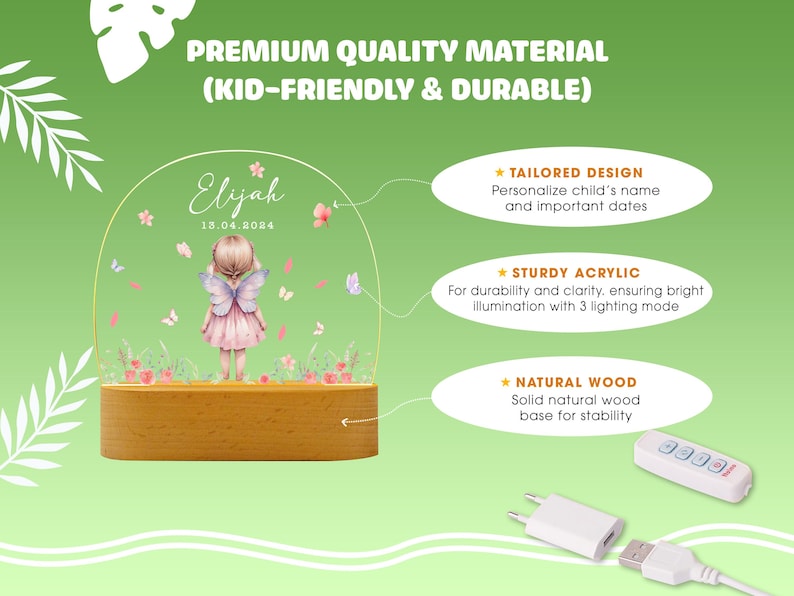 May include: A personalised acrylic night light featuring a fairy illustration and the name "Eljah" and date "15.04.2014". The night light has a wooden base and includes a remote control.