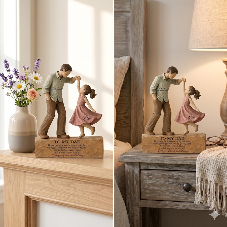 May include: A resin figurine of a father and daughter dancing, set on a rectangular base with the engraved text TO MY DAD. The father wears a green shirt and brown pants, while the daughter wears a pink dress. The names Michael and Ella are inscribed on their clothing.
