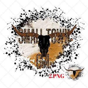 May include: A black and white bull skull with brown and black leopard print horns and the text "Small Town Girl" in the center. The background is a brown and white cowhide with black splatter paint.