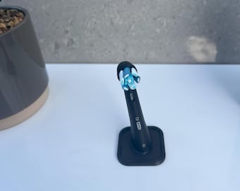 Braun Oral B iO brush head stand in a variety of colours