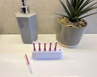 Interdental brush stand for six GUM brushes