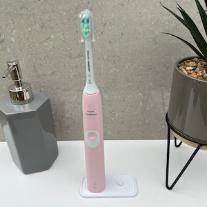 Toothbrush stand for 1, 2, 3 or 4 Philips Sonicare electric toothbrushes