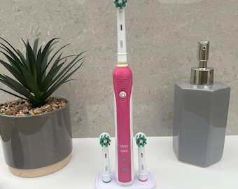 Stand for Oral B toothbrush and two brush head