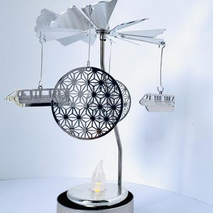 Epcot Monorail and Spaceship Earth Tea Light Candle Spinner Silver
