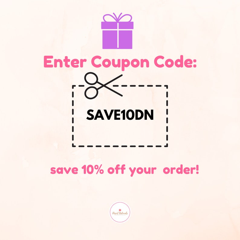 May include: A pink gift box with a white bow and a coupon code for 10% off your order. The coupon code is SAVE10DN.