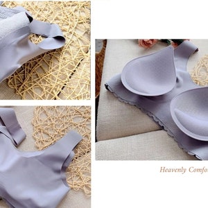May include: A gray seamless bra with removable cups and lace trim. The bra is made of a soft, stretchy material and has a comfortable fit. "Heavenly Comfort" is written on the bottom of the image.
