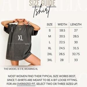 May include: A size guide for a t-shirt, with measurements in inches. The model is wearing an XL. The guide includes sizes S, M, L, XL, 2XL, and 3XL, with corresponding width and length measurements. The text advises women to select two or three sizes up for an oversized fit.