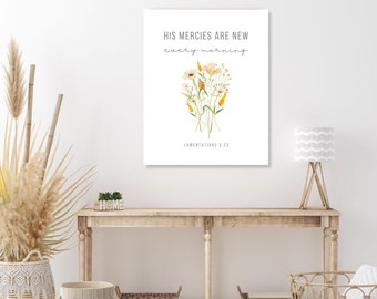May include: A white canvas print with a floral illustration and the text "His mercies are new every morning" and "Lamentations 3:23".