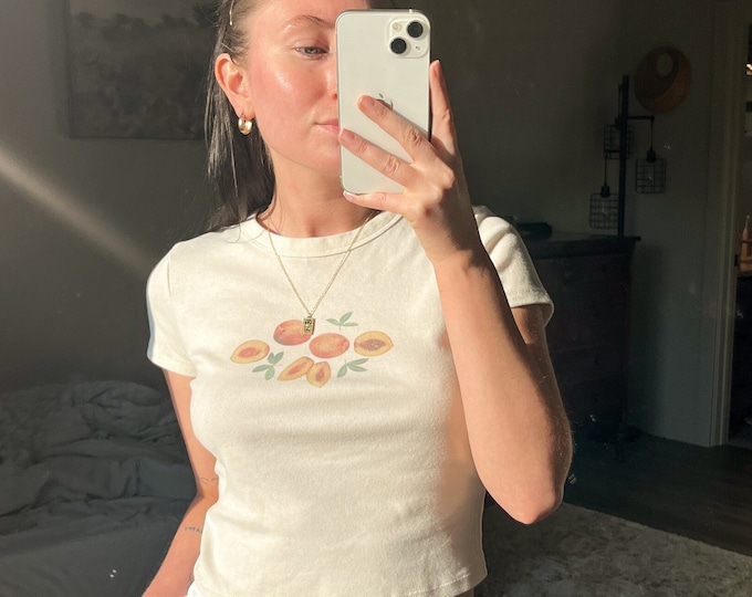 Featured listing image: Just Peachy Baby Tee | Summer Baby Tees | Coquette Aesthetic Graphic Tee | Peaches Baby Tee | Fruit Shirt