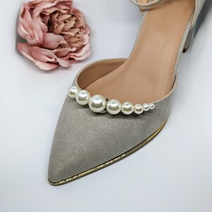 Shoes with outlet pearl embellishments