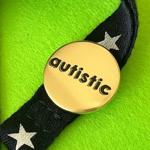 Gold metallic Autistic badge, pocket pebble, magnet or keyring.  Gold autistic badge, neurodiversity neurodivergent awareness & celebration