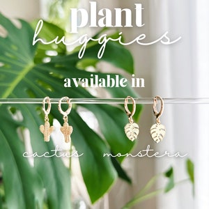 May include: Gold hoop earrings with a choice of cactus or monstera leaf charms. Plant huggies available in cactus or monstera.