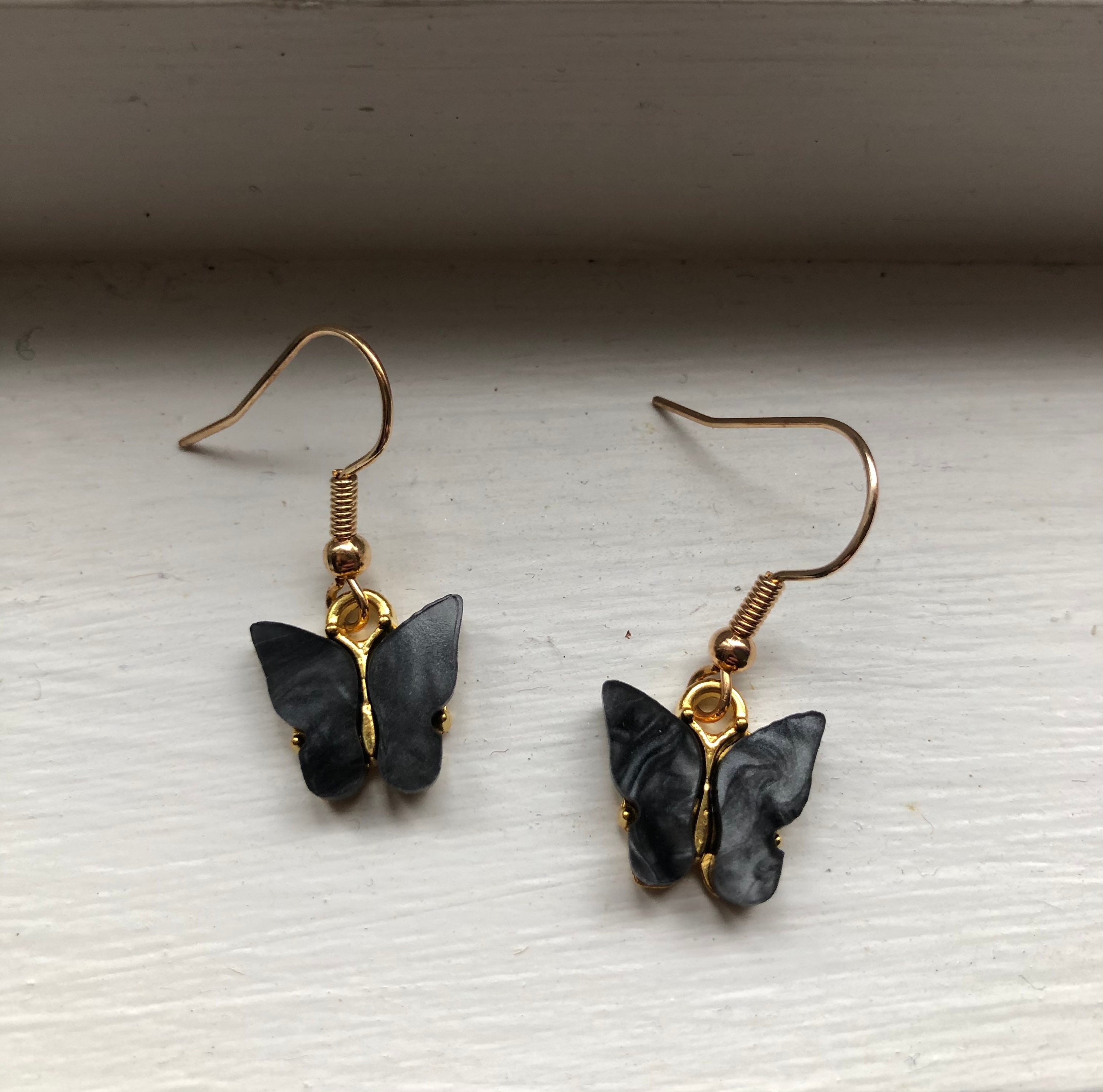 Butterfly Drop Earrings in Black & Gold