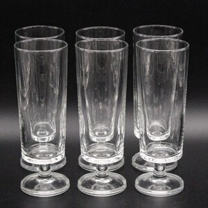 Puede incluir: Juego de seis vasos de beber de vidrio transparente con forma alta y cil&iacute;ndrica y base corta y acampanada.