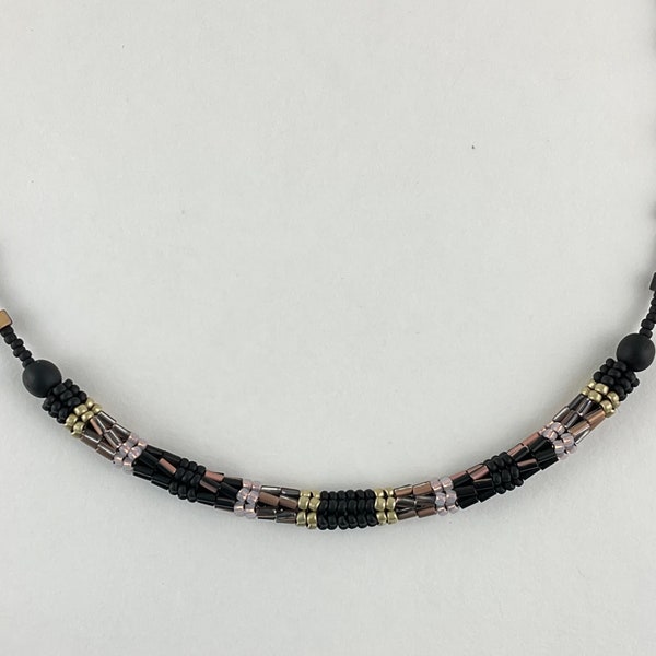 Banded cord necklace.  Black, gold, alabaster pink beaded cord necklace.  Ndebele cord necklace.