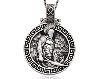 May include: Silver pendant necklace featuring a detailed depiction of a Spartan warrior with a sword, set against a textured background with a Greek key border.