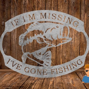 May include: A metal sign with a bass fish silhouette and the text "If I'm Missing I've Gone Fishing". The sign is on a wood background.
